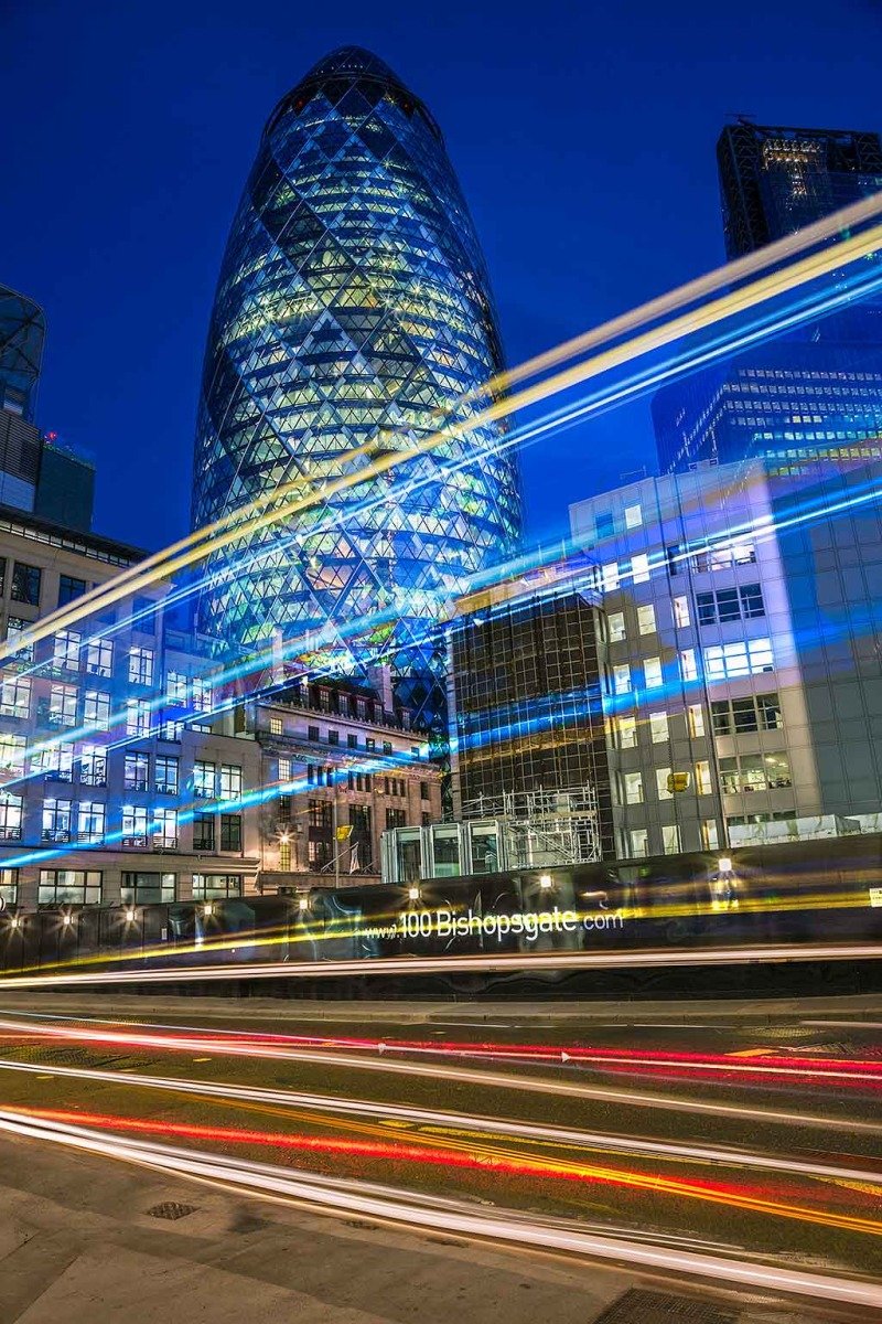 London Gherkin Building at Night with Car Light Trails London Gherkin Building at Night with Car Light Trails