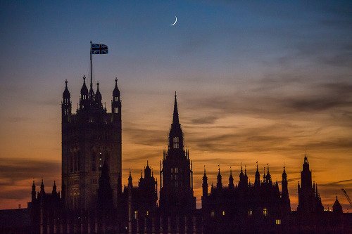 London Westminster Palace Parliament Building Union Flag sunset night sky