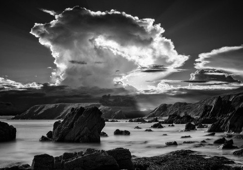 Pembrokeshire-coast-landscape-black-white-sun-beam-clouds