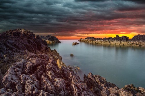 jagged rocks ocean colorful sunset neutral density ND filter long exposure