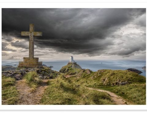 TZ Prints fine art landscape photograph Welsh lighthouse and old stone cross and stormy sky